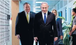  ?? THOMAS COEX/AFP/GETTY IMAGES ?? In his first trip abroad since being sworn in as U.S. secretary of state, Mike Pompeo, left, met with Israeli Prime Minister Benjamin Netanyahu.