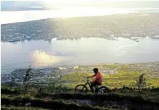  ?? Picture: SERGEI GAPON/ ANADOLU AGENCY VIA GETTY IMAGES ?? ARCTIC SCENERY: Views from Tromsø in Norway