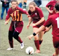  ??  ?? Cassia Pollard, right, in action for City’s under-16 girls against Petts Wood