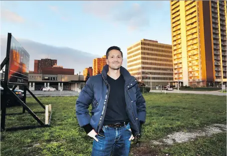  ?? WINDSOR STAR FILES ?? Peter Valente stands on Ouellette Avenue just north of Erie Street in Windsor last year, after announcing plans to build a 24-unit apartment building on the site. Valente, who voiced some concern over plans to locate the Downtown Mission across the street, told city council this week that he’ll proceed with even bigger plans for the project.