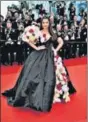  ?? ?? Deepika Padukone (left) and Aishwarya Rai on the Cannes red carpet this year
