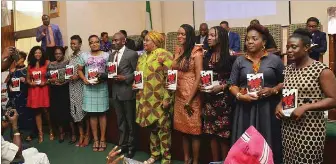  ??  ?? Female filmmakers from Left, Remi Vaughan- Richards, Vanessa Nzediegwu, Ronke Macaulay, Belinda Yanga-Agedah, Tope Oshin, Mildred Okwo, Grace Edwin-Okon, Ema Edosio, Pat Oghre and Adeola Osunkojo with Niran Adedokun, of the book: “Ladies Calling the...