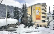  ??  ?? A Modi billboard that has come up at Davos.