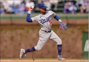  ?? MICHAEL REAVES — GETTY IMAGES ?? Mookie Betts played shortstop in the Dodgers’ spring training game on Friday, a position he hadn’t played since 2012 in Class-a before starting 12 games there for the Dodgers last season.
