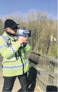  ?? Picture: Dyfed-Powys Police ?? An officer from Go Safe Cymru conducting speed checks on the A40 heading towards Carmarthen.