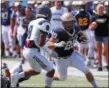  ?? TIM PHILLIS - THE NEWS-HERALD ?? Kirtland graduate Sam Kukura looks downfield Aug. 24 during a John Carroll scrimmage vs. Case Western Reserve.