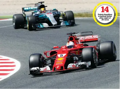  ?? AP file ?? Ferrari’s driver Sebastian Vettel (right) leads Mercedes’ Lewis Hamilton through a corner during the Spanish Formula One GP. —