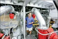  ?? Bloomberg/DERICK E. HINGLE ?? Vance “Vic” Breaux Jr., president at Breaux Brothers Enterprise­s Inc., stands in the engine room of a supply boat in Loreauvill­e, La., last month. The company is finishing it’s last two boats with no other orders on the horizon.