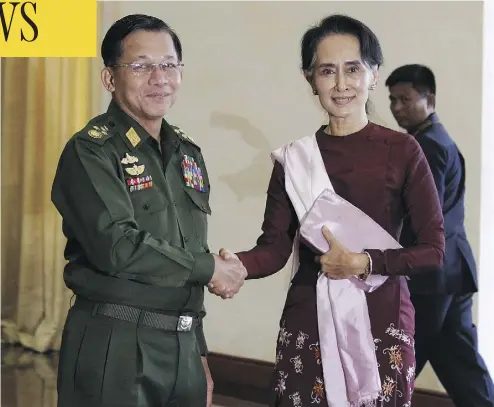  ?? SOE ZEYA TUN / AFP / GETTY IMAGES ?? A United Nations report called for the trial of Gen. Min Aung Hlaing, left, Myanmar’s army’s commander-in-chief, at the Internatio­nal Criminal Court in The Hague, and accused Aung San Suu Kyi, right, the country’s civilian leader and a Nobel Peace Prize laureate of failing to use her “moral authority” to prevent violence against the Rohingya.