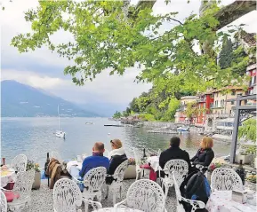  ??  ?? The town of Varenna, on Lake Como, is the perfect place to savour a lakeside meal or aperitivo.