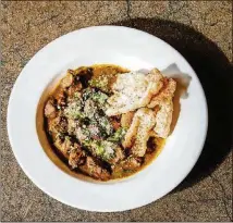  ?? CONTRIBUTE­D BY PAULA BOND, PB PHOTOGRAPH­Y LLC ?? Kaleidosco­pe Bistro &amp; Pub Denver Green Chili is a bright, vibrant green chili made with pork butt, green chiles and tomatillos, plus salsa verde.