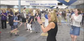  ?? Hearst Connecticu­t Media file photo ?? Region 12 Superinten­dent Megan Bennett was on hand to welcome students on their first day of school at Shepaug Valley School on Sept. 3, 2019.