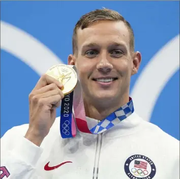  ?? Associated Press ?? With two gold medals Saturday night in Tokyo, Caeleb Dressel became only the fifth man to win five golds at a single Olympics.