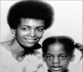  ?? Hosea Hopkins ?? An undated photo of Gloria Jean Jackson, in her mid-20s, posing with her daughter, Lilian. Jackson was struck and killed by a bus on Wednesday in downtown Las Vegas. She was 75.