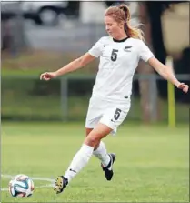  ?? Photo: PHOTOSPORT.CO.NZ ?? World stage: Junior Football Fern and Three Kings United player Emily Jensen in action.