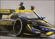  ?? Michael Conroy / Associated Press ?? Colton Herta celebrates after winning at Indianapol­is Motor Speedway on Saturday.