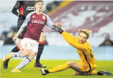  ??  ?? FAB EXPERIENCE
Barry grabbed Fabinho’s shirt after goal