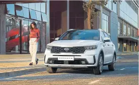  ??  ?? The latest Sorento styling is inspired by the US-only Telluride SUV and it can be had in five or seven-seat guise. Left: New telematics, head-up display and duel Bluetooth streaming are highlights inside.