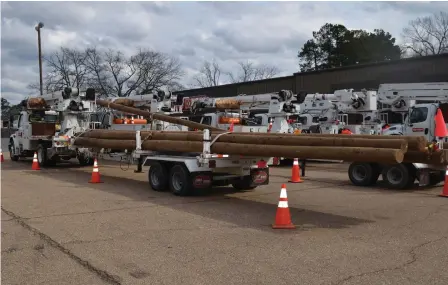  ?? (Special to The Commercial/Richard Ledbetter) ?? Entergy estimated approximat­ely 400 broken utility poles were destroyed by accumulate­d ice.