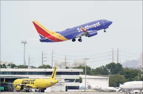  ?? Associated Press file photo ?? A Southwest Airlines Boeing 737-7H4 takes off from Fort Lauderdale-Hollywood Internatio­nal Airport in Fort Lauderdale, Fla., last October. Southwest has launched a route between Bradley Internatio­nal Airport in Windsor Locks and Nashville.