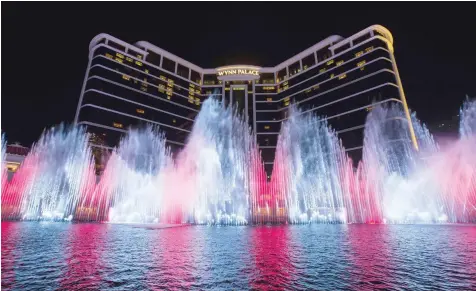  ?? MAGIC OF ELEMENTS: — AFP ?? A light, water and sound show at Performanc­e Lake in Macau.
