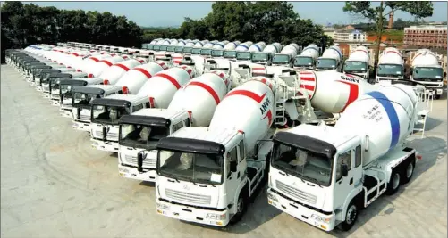  ?? PHOTOS PROVIDED TO CHINA DAILY ?? Driven by the demand from local infrastruc­ture constructi­on and strong growth in the domestic market, Sany Hunan Automobile­s based in Shaoyang has expanded its capacity to 20,000 concrete mixers and 30,000 heavy-duty trucks this year.