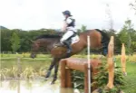  ??  ?? Lizzie Baugh and Quarry Man go double clear for young rider ninth