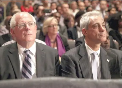  ?? SUN- TIMES FILES ?? Then- Gov. Pat Quinn and Mayor Rahm Emanuel attend a speech by then- President Barack Obama in 2014.