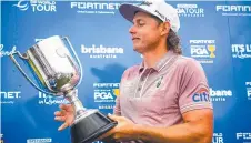  ?? Picture: AFP ?? Cameron Smith with the Australian PGA trophy.