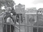  ?? DIMA AMRO ?? The Orange Mound community unveiled a historic marker Aug. 20, 2021 at the Deaderick Family Cemetery to honor enslaved Africans.