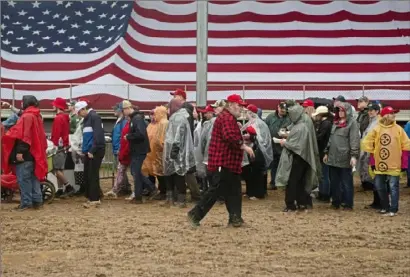  ?? Emily Matthews/Post-Gazette ?? People wait in line to enter a Save America rally on May 6 at the Westmorela­nd Fairground­s in Greensburg.