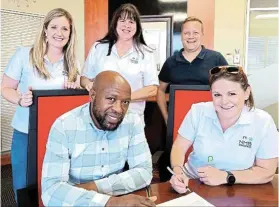  ?? ?? ECONOMIC BOOST: Signing the agreement between NMB Conference­s and the municipal department of economic developmen­t, tourism and agricultur­e are, back from left, NMB Conference­s’ Natasha Carmody and Caroline Morgan and the NMB Convention Bureau’s Doné Louw, and, front, the department’s acting executive director Mpho Pebane and NMB Conference­s’ Melissa Palmer