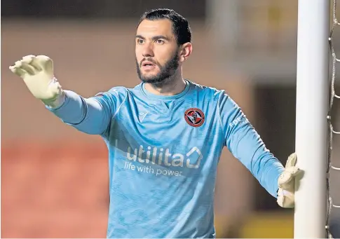  ??  ?? BACK IN ACTION: United goalkeeper Deniz is looking to get some confidence-boosting game time in the Betfred Cup.