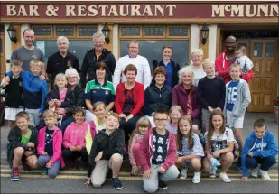  ??  ?? The gang from Belarus having a blast in Ballybunio­n on what was the 14th year of a special link with Adi Roche’s Chernobyl Children’s Internatio­nal charity. Inset: On the bumpers and the Coastguard chopper flying over.