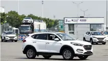  ??  ?? HYUNDAI CARS leave a plant of Hyundai Motor Co. in Beijing, China, Aug. 30.