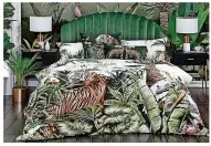  ?? ?? Caspian jungle bedding, from £125£145, Avalana
This striking bedding evokes an exotic wildlife sanctuary, where tigers peer through palms. Could this be the closest thing to a night safari, with the promise of sleeping within a whisker of a tiger?