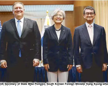  ??  ?? US Secretary of State Mike Pompeo, South Korean Foreign Minister Kang Kyung-wha (middle) and Japanese Foreign Minister Taro Kono pose during a trilateral meeting in Seoul yesterday. REUTERS