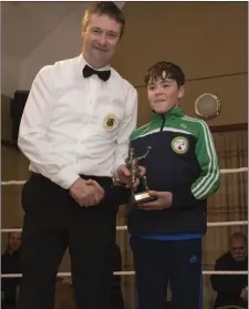  ??  ?? Best home boxer Brian Gilroy collects his award.