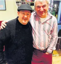  ??  ?? Johnny Vegas at Deli Volare with owner Onofrio Maimone