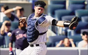  ?? John Minchillo / Associated Press ?? The New York Yankees’ Gary Sanchez misses a pop fly against the Cleveland Indians in the fifth inning on Saturday.