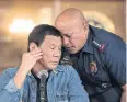  ?? AFP ?? President Rodrigo Duterte, left, and ex-police chief Ronald Dela Rosa.