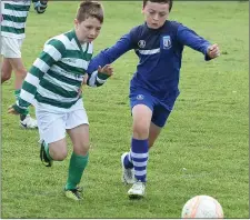  ??  ?? Jake Tyrrell tries to win possession for Termonfeck­in.