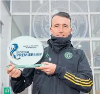  ??  ?? David Turnbull with his Player of the Month award