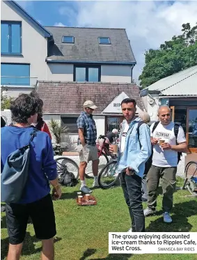  ?? SWANSEA BAY RIDES ?? The group enjoying discounted ice-cream thanks to Ripples Cafe, West Cross.