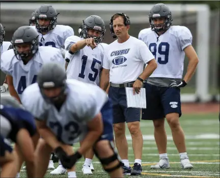  ?? TIM PHILLIS — FOR THE NEWS-HERALD ?? Case Western Reserve coach Greg Debeljak watches a practice Aug. 16.