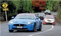  ??  ?? Special stage 7 on Chaslands Highway, in the Catlins, with some of the cars coming through Papatowai.