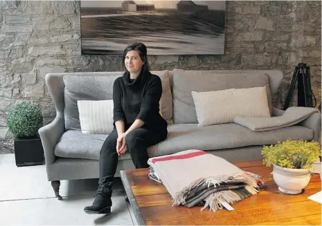  ?? PHOTOS: MARIE-FRANCE COALLIER/ THE GAZETTE ?? Left: Lysanne Pepin with some of the items in her new store: Four-seater sofa, $4,920, from the Lauren collection, which she designed. A work of art on the wall, November, $3,800, is based on a photograph she took. The coffee table, $1,500, is made of...