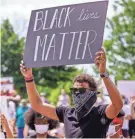  ?? THE OKLAHOMAN VIA USA TODAY NETWORK ?? Atlanta Hawks star Trae Young at a Black Lives Matter rally in June.