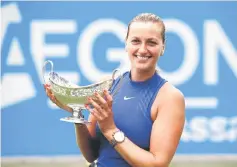  ??  ?? File photo of Czech Republic’s Petra Kvitova with the trophy after winning the Aegon Classic at Edgbaston Priory Club, Birmingham, Britain. — Reuters photo