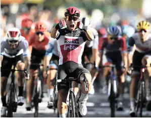  ?? REUTERS ?? LOTTO Soudal rider Caleb Ewan of Australia sprints to victory on yesterday’s third stage.